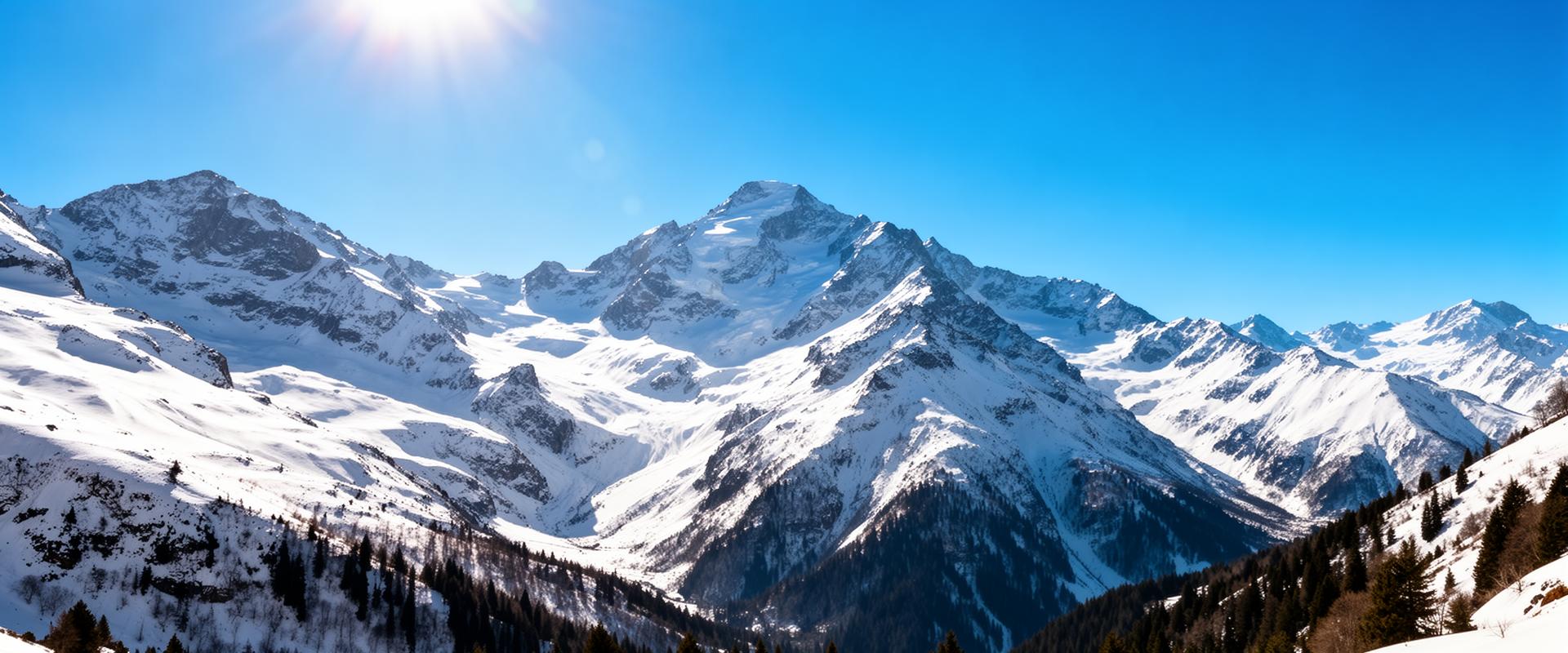 Sunny snow-capped mountain landscape with blue sky